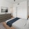 Bedroom with natural lighting and high ceilings