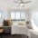 Bedroom with natural lighting and high ceilings
