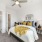 Bedroom with natural lighting and high ceilings